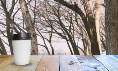 Fototapeta na wymiar Hot coffee cup on wood table.