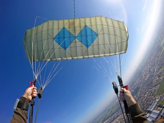 Point of view of skydiver piloting his parachute
