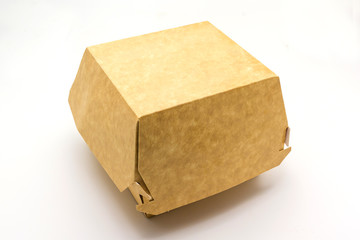 A brown food box, packaging for hamburger, lunch, fast food, burger and sandwich, isolated on white...