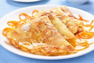 Pancakes with orange syrup