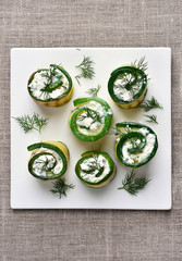 Zucchini stuffed with curd cheese, top view