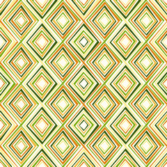 Seamless background in the geometric pattern  of green and orange colors.