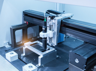 Industrial robot working in phone factory