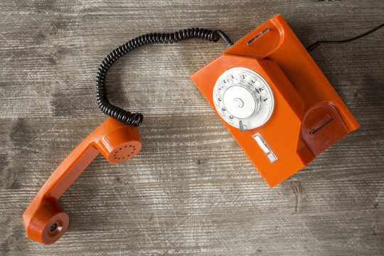 Orange retro phone-top view