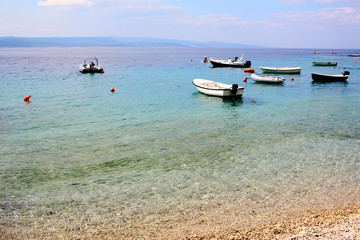 Beautiful sea beach with boats