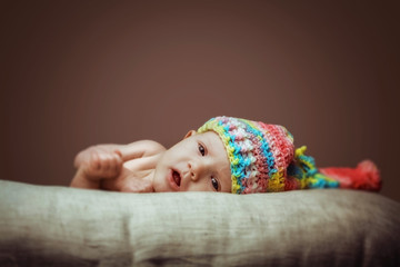 Cute newborn baby girl in Knit Hat