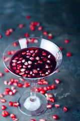 pomegranate cocktail and ripe red  fruit