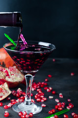 Pouring drink into a glass