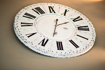 Wall clock with roman numbers