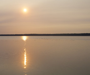 Fototapeta premium Smoky sunrise in Canada