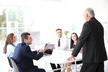 Business training concept. Colleagues at an office meeting