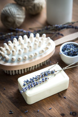 Fototapeta na wymiar accessories for bath and spa: natural soap, lavender, candle and