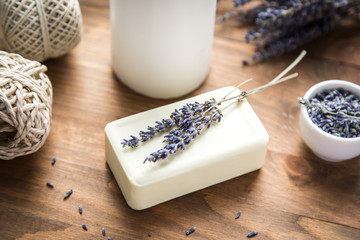 Obraz na płótnie Canvas accessories for bath and spa: natural soap, lavender, candle and