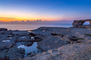 Fototapeta na wymiar Amazing Sunset near Azure Window, Gozo Island, Malta
