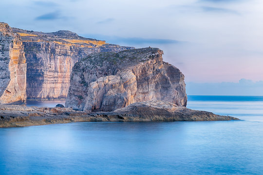 Fototapeta Fungus Rock in the Dwejra Bay using as Background on Wallpaper, Gozo, Malta
