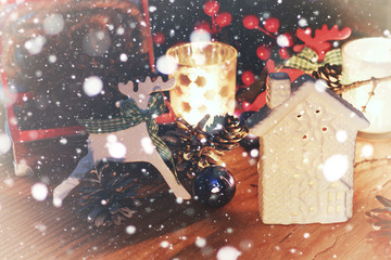 new year snow table with pine cone and candle
