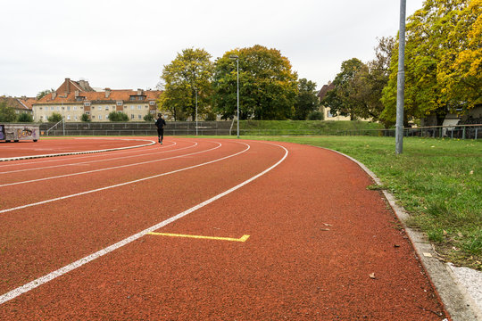 Jogger on a running track