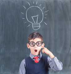 Funny little genius having an idea. Education and innovation concept