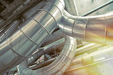 Fototapeta premium Industrial zone, Steel pipelines in blue tones