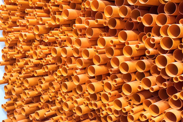 PVC pipes stacked in construction site