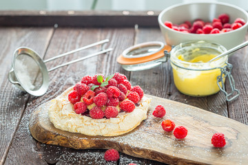 Pavlova Cake with Lemon Curd and Fresh Summer Berries 