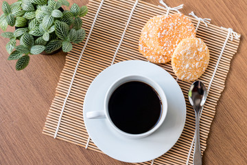 Food background. Crispy Rice Crackers with Hot cup of coffee on
