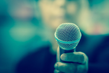 blurred of businessman speech, talking with microphone