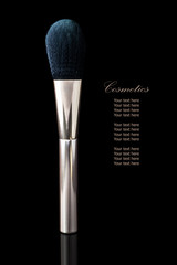 Makeup Brush on professional cosmetic isolated on black backgrou