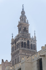 Fototapeta premium Bell tower Giralda, former minaret of Cathedral church, Seville,
