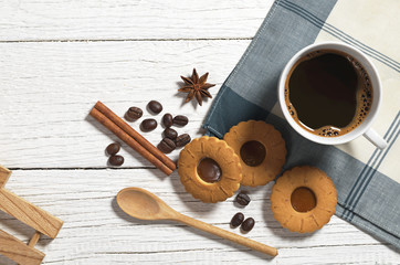 Cup of coffee with biscuit