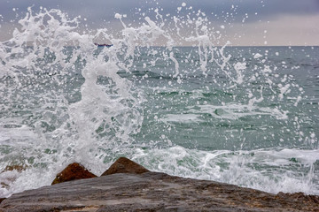 sea waves smashed on rocks. beauty water spray