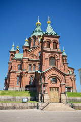 Fototapeta na wymiar Uspenski Orthodox cathedral, famous landmark in Helsinki, Finlan