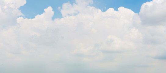 blue sky background with tiny clouds