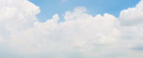 blue sky background with tiny clouds