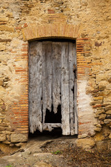 Fragmen of rotten wooden antique door