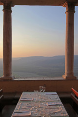 Obraz premium sunset dining tables n hills