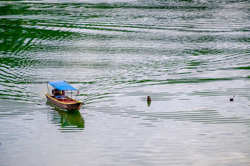 Service boat at the river