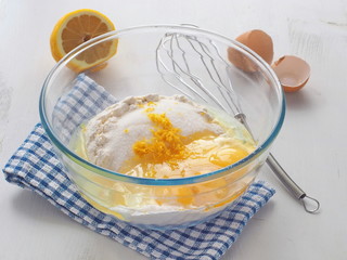 Cooking process. Ingredient mix for sponge cake, buns, cupcakes or muffin. Preparation stage. Baking and cooking concept, ingredients and utensils