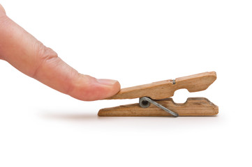 hand holds the clothespin