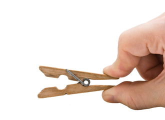 hand holds the clothespin