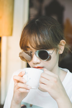 Woman drinking coffee for relaxed.