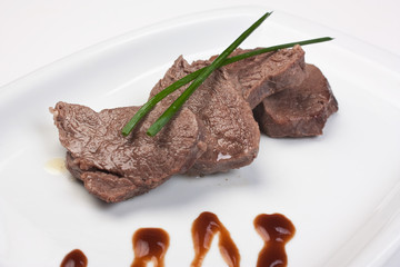 dishes of roast meat