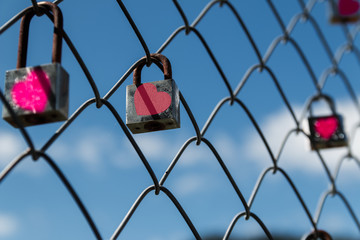 Fototapeta na wymiar love locked,rusty lock on fence.