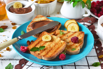 Good morning - toast with walnut, chocolate paste, banana and ho