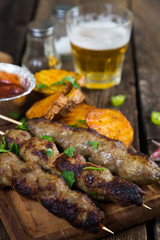 Kebab, fried potatoes and beer