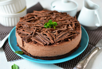 Chocolate cheesecake with mascarpone, chocolate biscuit and gana