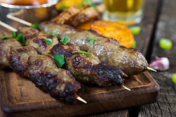 Kebab, fried potatoes and beer