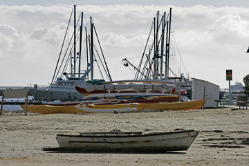 boat on beach w clouds