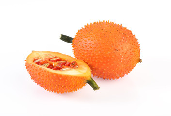 Gac fruit slices isolated on white background