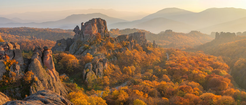 Belogradchik rocks at sunset /
Magnificent panoramic sunset view of the Belogradchik rocks in Bulgaria, lit by the last rays of autumn sun